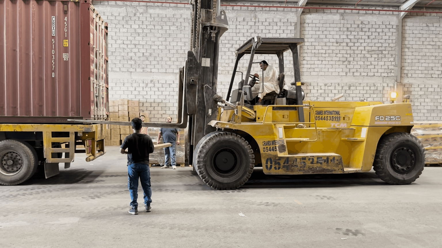 Forklift operations in Safe Hands warehouse
